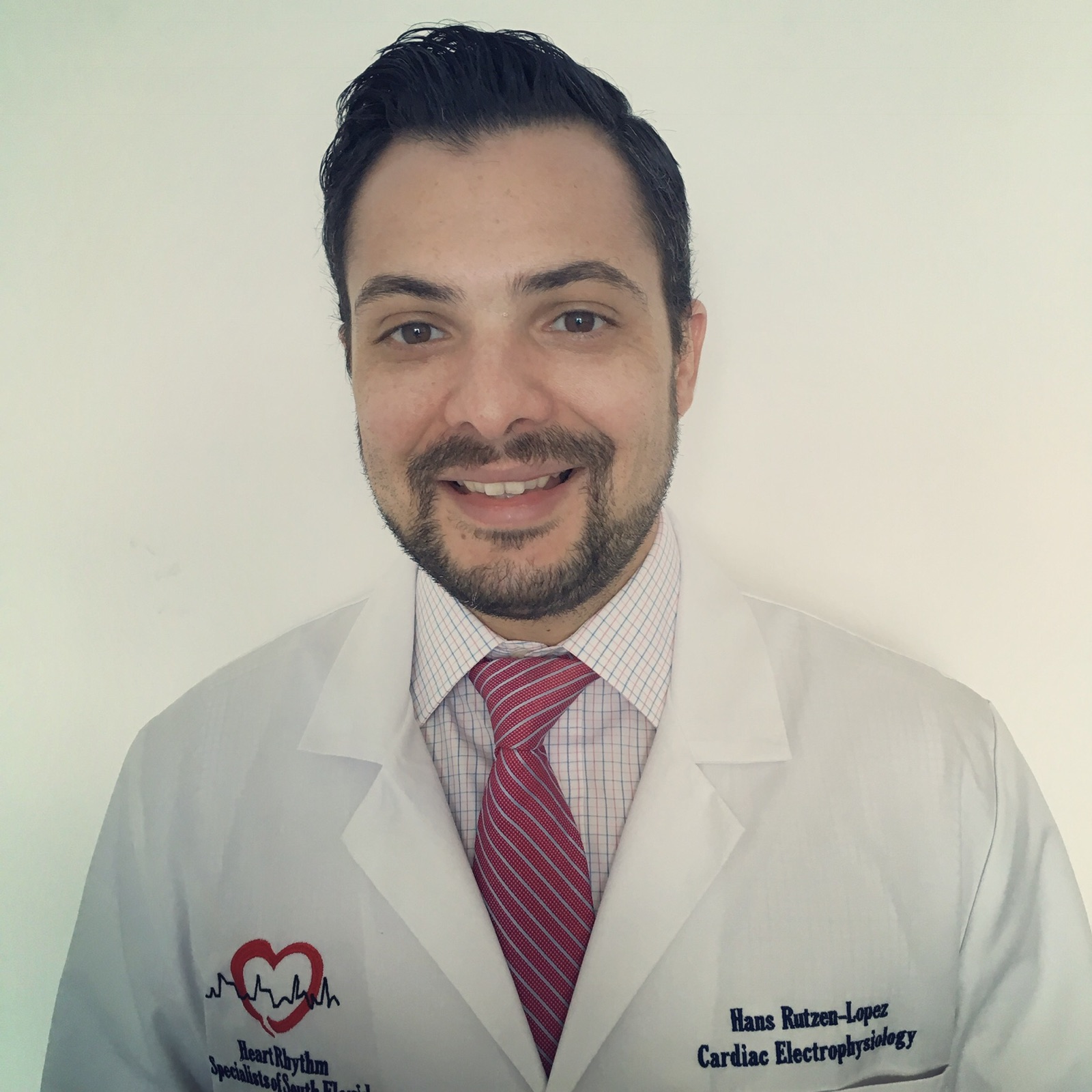 Professional headshot of Dr. Hans Rutzen-Lopez, MD — cardiac electrophysiology specialist and Sub-Investigator on arrhythmia and device trials at Amavita Research